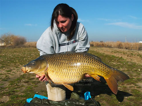 Woman angler with huge fish